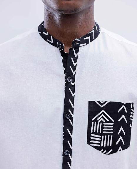 Close-up of a 100% cotton hipster style African Dashiki shirt for men with buttons and traditional patterns on the collar and pocket.